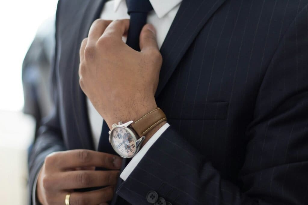Trading in the UK? Here are Some Key Facts. 6 Man in a suit indicating a professional trader